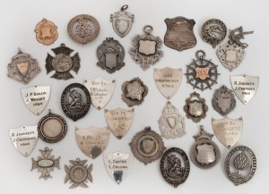 Assorted silver fobs, plaques, badges, etc, 19th/20th century, (32 items)
