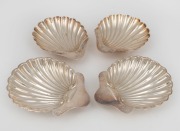 Two pairs of antique English sterling silver scallop shaped condiment dishes, London and Sheffield made, early 20th century, (4 items), ​​​​​​​13.5cm and 12cm wide, 254 grams total