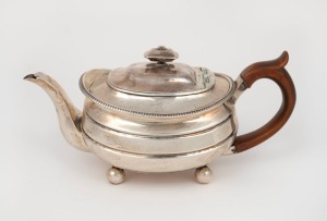 An antique&nbsp;English sterling silver teapot, made by Solomon Hougham of&nbsp;London, circa 1789, 12cm high, 25cm wide, ​​​​​​​508 grams including timber handle