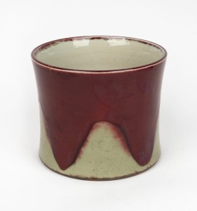 A Chinese sang de boeuf brush pot vase, 19th/20th century, underglaze blue six character mark to base, 16cm high, 19cm diameter