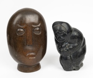 A carved stone head signed "KAPORE", together with an Inuit carved stone figure, (2 items), ​​​​​​​26cm and 21cm high