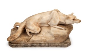 An antique French&nbsp;Carrara marble sculpture of a fox with inset glass eyes, circa 1910, 20cm high, 39cm wide, 14cm deep.