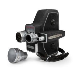 BELL & HOWELL: 240 Automatic EE 16mm movie camera, c. 1957, in maker's case with four lenses, instruction booklet, and key.