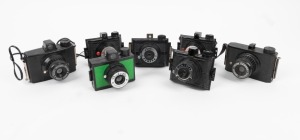 VARIOUS MANUFACTURERS: Seven c. 1960s plastic viewfinder cameras - one Babette, one Can-Tex, one Cin&eacute; Camera, one Orion Camera, one Star-Lite Brown, one Tilso Feather-Weight, and one Wales-Baby. (7 cameras)