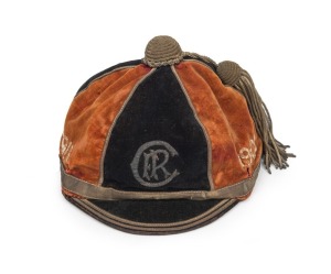 NEW ZEALAND: T. Bain's Canterbury Honour Cap, black and tan velvet, wire embroidered 'CFR' to front panel, additionally embroidered around sides '1907, S.I. 1908, 1909, S.I. 1910, 1911', and with intact tassel to the crown; made by Wallace and Gibson of W
