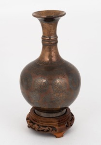 A Chinese porcelain vase with unusual silvered bronze finish on timber stand, decorated with symbols and flowers, 19th/20th century, underglaze&nbsp;blue six character mark to base, 21cm high overall