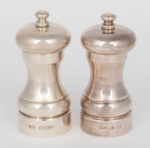 Two English sterling silver pepper mills, 20th century, 10.5cm and 11cm high