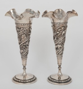 A pair of Indian silver trumpet vases with weighted bases, 20th century, 20cm high