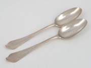 A pair of antique Channel Islands silver dog nose tablespoons, 18th century, 21cm long, 120 grams