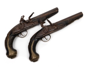 A pair of Indo-Persian flint lock pocket pistols in barn find relic condition (incomplete), 31cm long