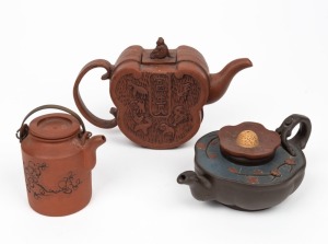 YIXING WARE group of three Chinese pottery teapots, 20th century, the largest 12cm high