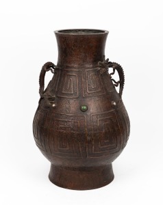 A Chinese reproduction bronze vase with dragon handles in the archaic style, late 20th century, 45cm high