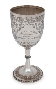 An antique English sterling silver presentation trophy cup of goblet form with bright cut engraving and bead decoration. Engraved "FAT CATTLE SHOW, 1901, Presented by The Rt.&nbsp;Hon'ble&nbsp;Sir Massey Lopes Bt, To C.W. Avery". Made in&nbsp;Sheffield, circa 1901 by At