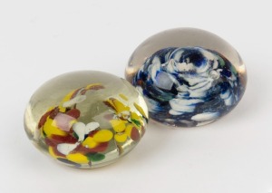 Two antique glass paperweights, 19th century, the larger 4cm high, 6.5cm wide