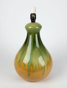 A green and yellow glazed pottery table lamp with later shade, ​​​​​​​the base 40cm high