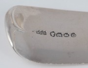 An antique English sterling silver fiddle pattern ladle&nbsp;with engraved crest, made by William Rawlings Sobey of&nbsp;Exeter, circa 1839;&nbsp;together with an antique French fiddle and thread pattern ladle, 19th century, (2 items), the larger 35cm long, 430 grams to - 2