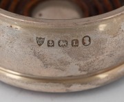 An antique sterling silver table cigar lighter, made in London, circa 1910; together with a pair of vintage sterling silver coasters with wooden inserts, by Elkington & Co. of Birmingham, circa 1935, (3 items), ​​​​​​​the lighter 7.5cm high, 222 grams tot - 4