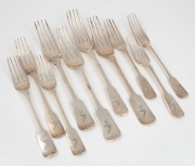 Ten assorted Georgian sterling silver forks in two sizes, all with engraved crests, early 19th century, 20.5cm and 17cm long, 474 grams total