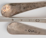 An 18th century sterling silver basting spoon with engraved feathered edge decoration (marks rubbed); together with a pair of Georgian sterling silver tablespoons with fine engraved decoration by Richard Ferris of Exeter, circa 1796, (3 items), the bastin - 2
