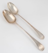Two fine quality Georgian sterling silver basting spoons, early 19th century, ​​​​​​​30.5cm and 31cm long, 206 grams total