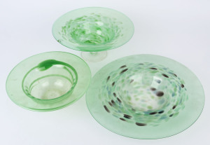 Three Australian green art glass bowls, circa 1995, the largest 38cm diameter