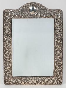 An antique English sterling silver framed mirror, by A. & J. Zimmermann of Birmingham, circa 1911, 47 x 33cm