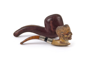 Gent's head portrait pipe, carved meerschaum and amber with silver collar in leather case, late 19th century, ​14cm long
