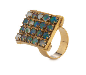 A vintage 9ct yellow gold ring, pave set with 20 opals in a square design, circa 1970s,&nbsp;