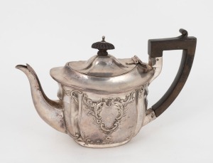 An antique English sterling silver teapot, made in Chester, circa 1904, ​​​​​​​14cm high, 22cm wide, 344 grams including handle