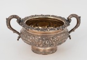 An antique sterling silver sugar basin, attractively decorated with floral chased motif, mid 19th century, 12cm high, 23cm wide, 416 grams - 2