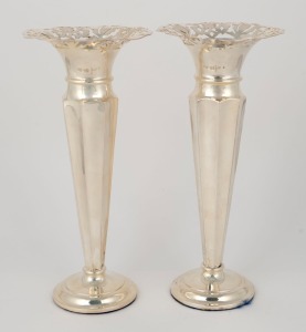 A pair of antique English sterling silver trumpet vases with convex faceted stems and flared pierced rims. Made by Walker & Hall of Sheffield, circa 1905, weighted bases, 21cm high