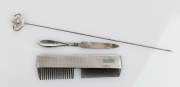 An antique engine decorated sterling silver comb, an antique silver nail file&nbsp;and a sterling silver Art Nouveau&nbsp;hatpin by Charles Horner, 19th and 20th century, (3 items), all bearing Chester hallmarks, the hatpin 22cm long