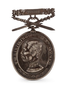 THAILAND: RAMA V Dushdi Mala silver medal with crossed sword and mace suspension clasp, circa 1896.