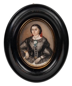 An antique oval miniature portrait of a lady in mourning, 19th century, remains of inscription verso (illegible), 16 x 13cm overall