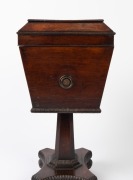 An antique English William IV period sarcophagus form&nbsp;cellarette, handsomely&nbsp;veneered in rosewood with knurled moulding and brass carrying handles to the sides.&nbsp;The tapered pedestal&nbsp;terminating in a quadriform base with brass castors, circa 1840, 74cm hig - 6