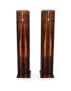 A pair of Art Deco-Style pedestals in the manner of Emile-Jacques Ruhlmann with book matched Macassar,&nbsp;ebony veneer and&nbsp;ivorine string&nbsp;inlay detail to the top edge,&nbsp;20th century, 129cm high, 23cm wide, 23cm deep