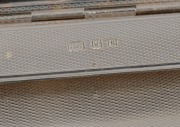 Three sterling silver cigarette cases, 20th century, the largest 14cm wide, 640 grams total - 3