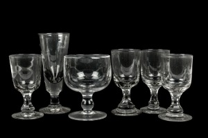 Six assorted antique English ale and rummer glasses, including four examples with faceted stems, 19th century, the largest 19.5cm high