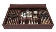 A fine antique English Kings pattern cutlery service for twelve. The forks and spoons made by Walter Tweedie&nbsp;of London, circa 1837. The&nbsp;entree knives stamped "A.H." circa 1831, the dinner knives&nbsp;made in Sheffield by Martin Hall & Co. Note all knives with 
