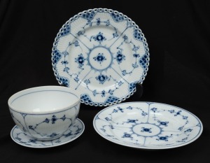 ROYAL COPENHAGEN blue fluted porcelain collection, including a full lace plate, bowl with accompanying&nbsp;plate and single saucer. Factory marks to the base. 20th century, (4 items), the lace plate 20cm diameter.