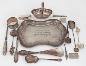 A one ounce 99.98 silver ingot, a sterling silver basket, a tray, four assorted spoons including an Australian example by Harris & Son, an antique stamp box, and pill box, napkin ring, shoehorn, hooks and implements, 19th and 20th century, (16 items), 340