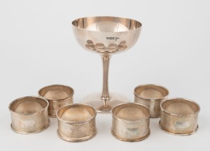 Six antique English sterling silver napkin rings with engine turned decoration, four made by Broadway & Co. of Birmingham, circa 1971; two by H. Bros (possibly Haseler Brothers) of Birmingham, circa 1963. Together with a sterling silver champagne bowl mad