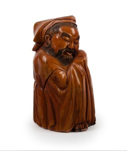 A Chinese carved mammoth ivory statue of a sage, in the Ming style, 19th/20th century, seal mark to base, 16cm high