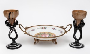 An Antique French Limoges gilt mounted table bowl with hand-painted floral decoration, marked to the base Limoges, France and original foil label, Circa 1920. Together with a pair&nbsp;of art glass candle sticks with black twisted trail decoration by Josefina 
