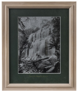TASMANIA: monochrome image of Russell Falls, circa 1980, after the painting by Haughton Forrest, which formed the basis of the design for Tasmania's 1899 4d Pictorial postage stamp; framed and glazed, overall 40.5 x 33cm.&nbsp;