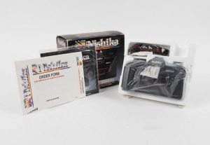 QUANTRONICS: Nishika 3-D N8000 four-lens camera, c. 1980, apparently mint in maker's box with carry strap and printed matter.