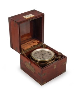 An antique English 56 hour marine chronometer&nbsp;in mahogany brass bound three tier case with mother of pearl retailers plaque "Iver C. Weilbach & Co., Kobenhavn, 139". Chain fusee jewelled movement with spring detent escapement and temperature compensated b