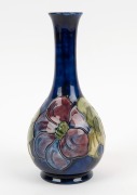MOORCROFT&nbsp;"Clematis" English pottery vase on blue ground, circular paper label to base, 21.5cm high - 2