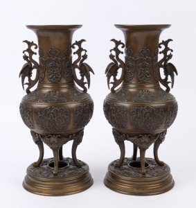 A pair of Chinese bronze mantle vases with phoenix handles, 19th/20th century, 38cm high