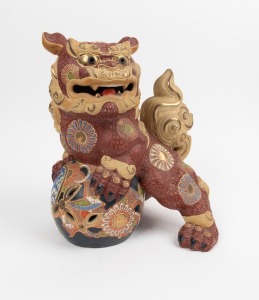 A Japanese earthenware temple lion, early to mid 20th century, 30cm high